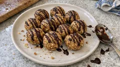 Τρουφάκια «της τεμπέλας» με ταχίνι, βρώμη και μαύρη σοκολάτα — χωρίς ψήσιμο